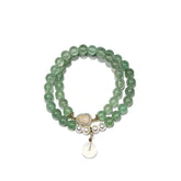 7.5mm Green Strawberry Quartz bracelet featuring delicate Pearl and Agate charms on white background.