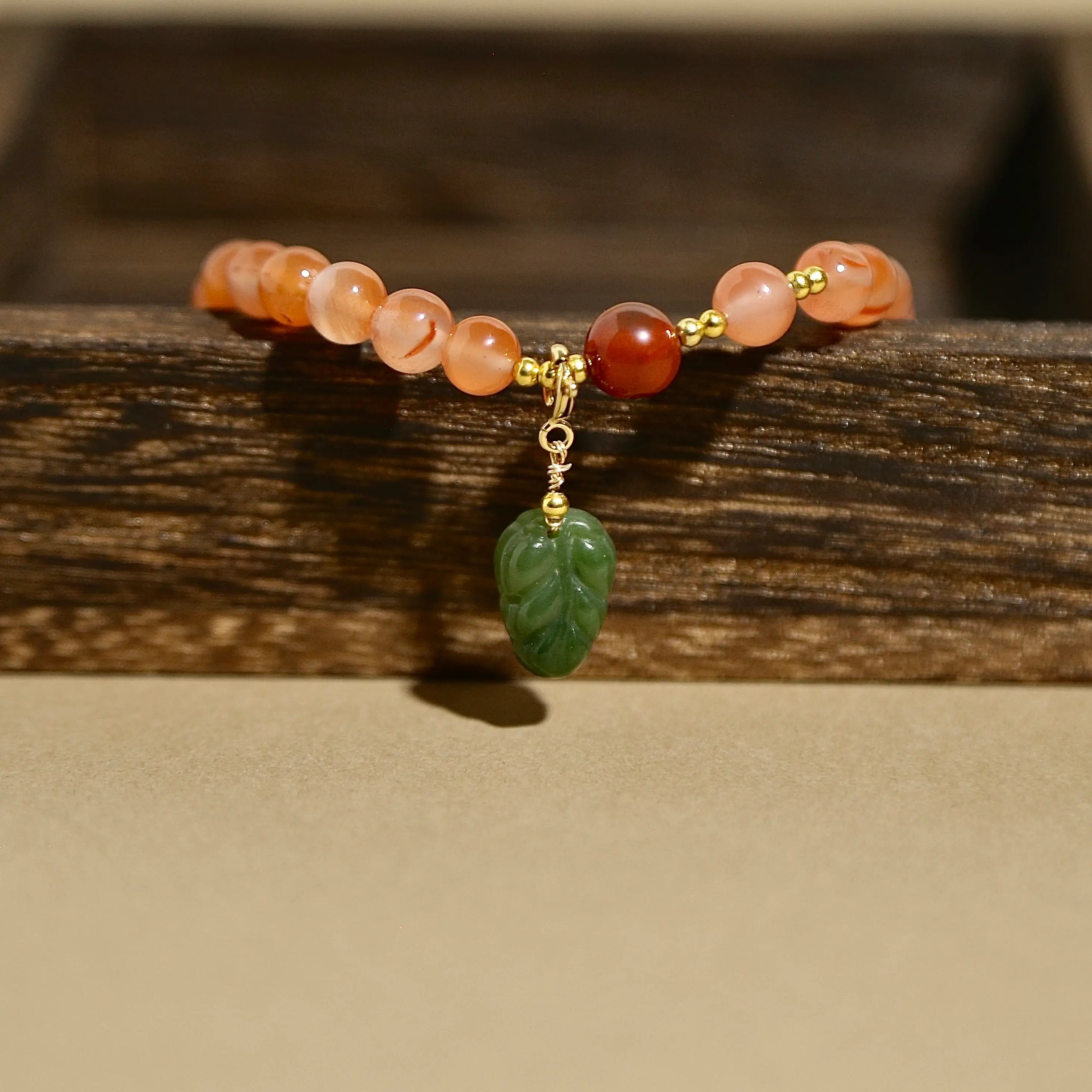 8mm Red Agate Bracelet with Green Jade Leaf Pendant, Designed for Love and Relationship