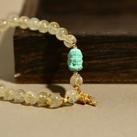 7mm Golden Rutilated Quartz Bracelet with Green Agate Ganesha & Prayer Wheel