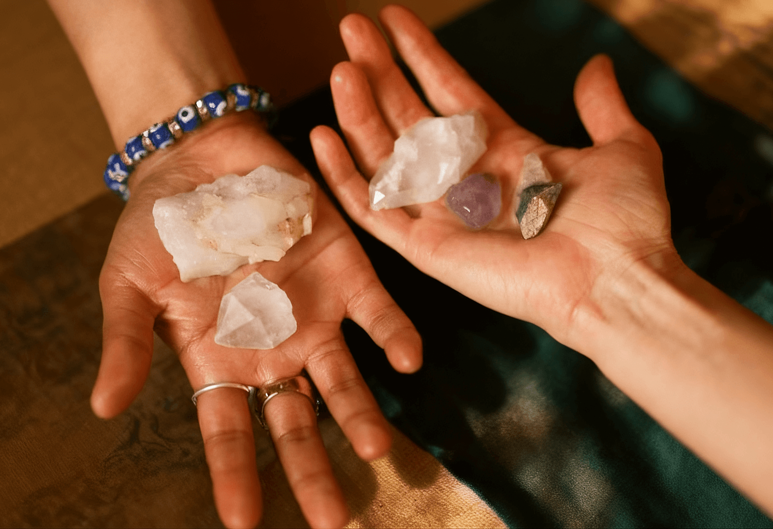 Display Amethyst  and Clear Quartz on the Hand, which Symbolizes Wisdom and Master Healer